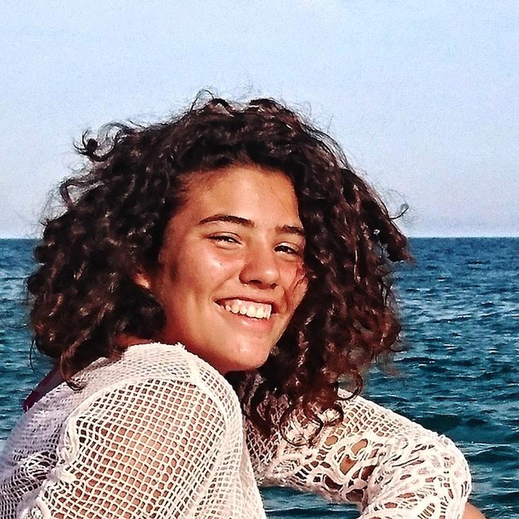 Portrait of Nova Reyes, group coordinator and fusion cooking expert